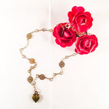 Bronze Heart Charm Necklace With 18kt Gold Plated Flower Chain.