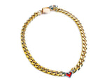 Gold Chain Necklace With Red Heart Shaped Charm.